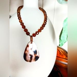 Brown beaded necklace with tortoise shell
